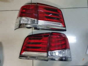 Задние фонари рестайлинг Lexus LX 570 2012-2015 красно-белые (комплект 4шт.)